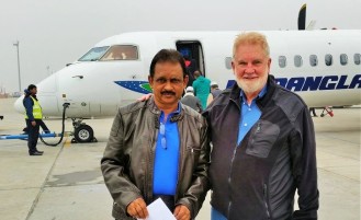 Sadi and Sam prepare to board flight to far-south Bangladesh.